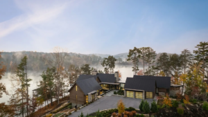 a house with a lake in the background